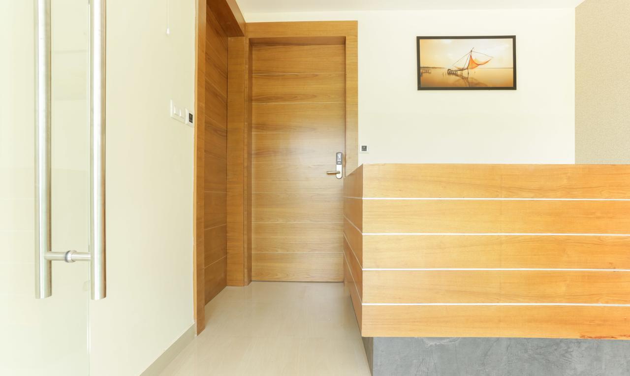 Treebo Trend Cmks Gulmohar Suites Коччи Экстерьер фото