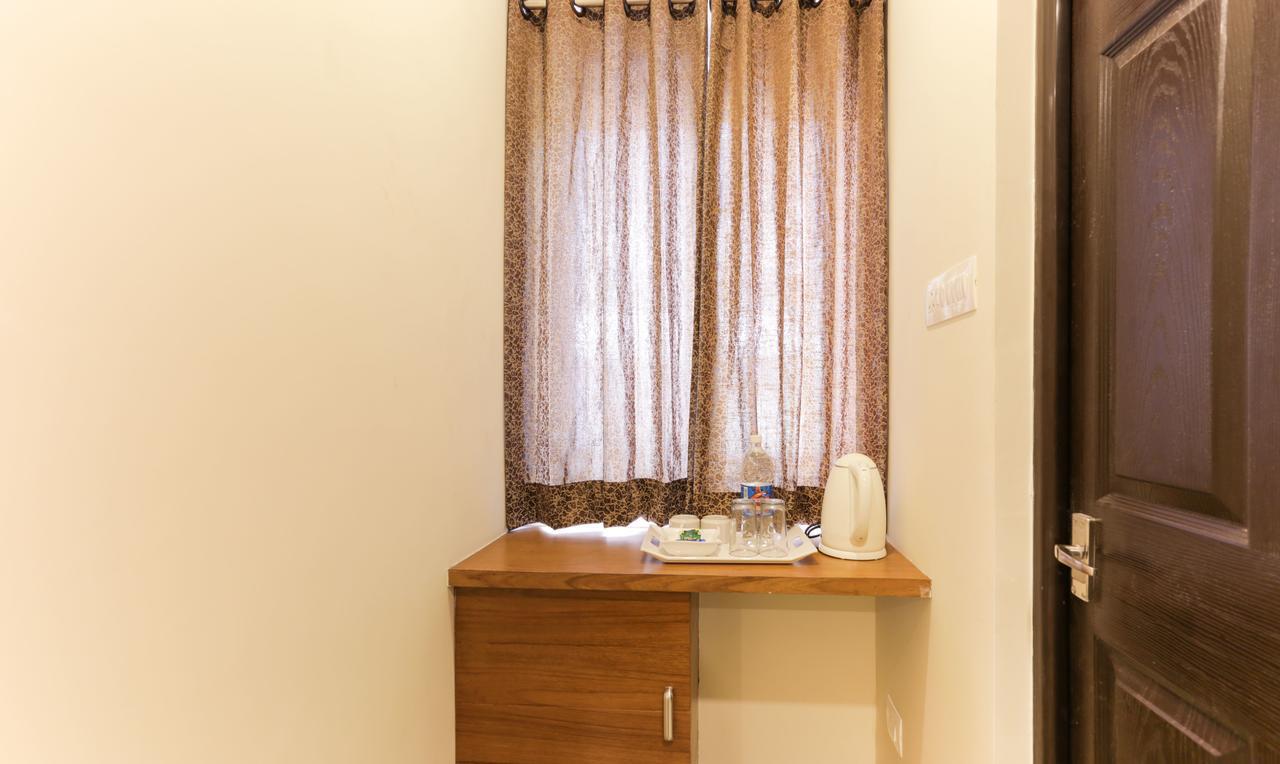 Treebo Trend Cmks Gulmohar Suites Коччи Экстерьер фото