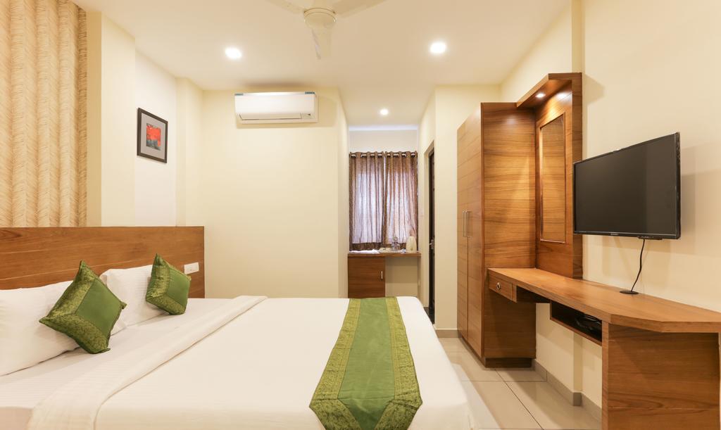 Treebo Trend Cmks Gulmohar Suites Коччи Экстерьер фото