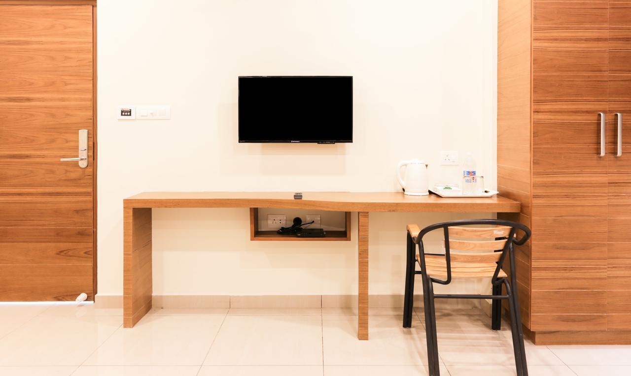 Treebo Trend Cmks Gulmohar Suites Коччи Экстерьер фото